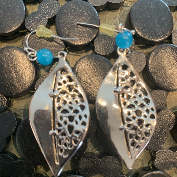 Silver and blue colored intricate dangly earrings. - Picture 7 of 7